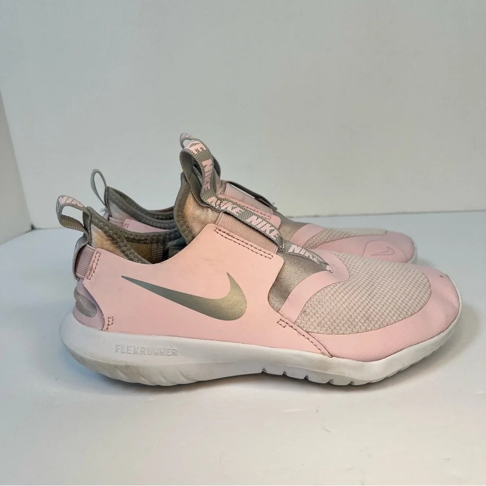 Nike Pink‎ Slip-On Sneakers with Streamlined Design